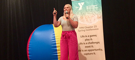 Photo of speaker on stage at YPN Chapter 25 spring conference